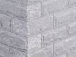 Zoom sur un muret en granite SIlver Rustica
