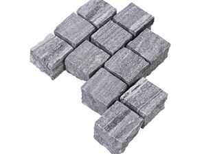 Les pavés en gneiss Urban Grey Line et un fond vide