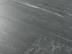 Les carreaux en grès cérame gris foncé Dolomit Black et leurs veinures blanches vues de près