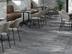 Les carreaux aspect béton Iron Graphite posés dans un restaurant
