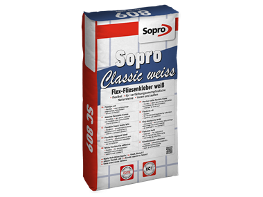 Un sac de mortier-colle flexible blanc