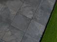 Dalles de terrasse Alpine Black et pelouse adjacente photographiées d'en haut